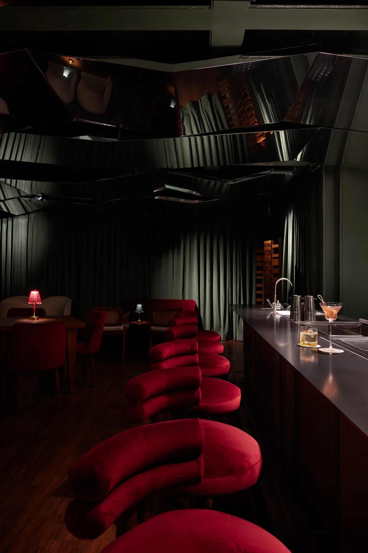 Cameo Bar, red stools along the counter